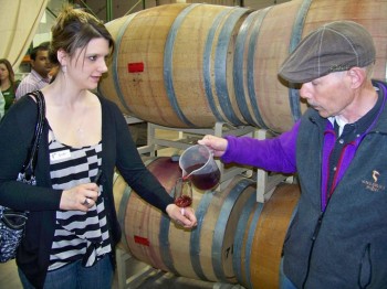 Bob Madill pouring barrel samples for a customer